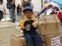 A child enjoying a meal of bread and chocolate milk